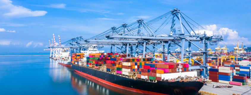 Container cargo ship at industrial port in import export business logistic and transportation of international by container cargo ship in the open sea. UK Sea Ports Customs Clearance